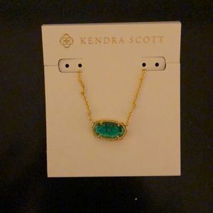 Elisa Gold Extended Length Pendant Necklace, color is London blue